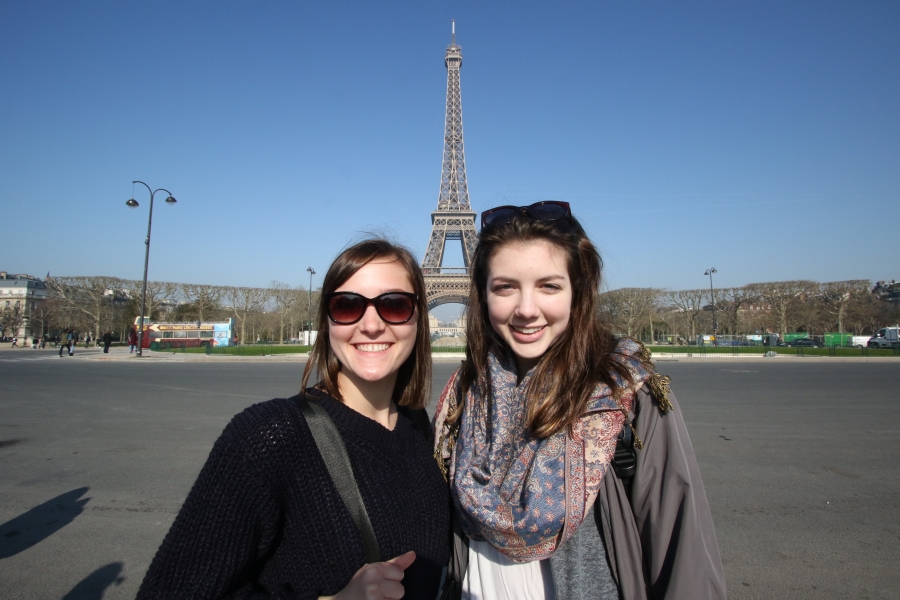 2 girls with eiffel tower in background